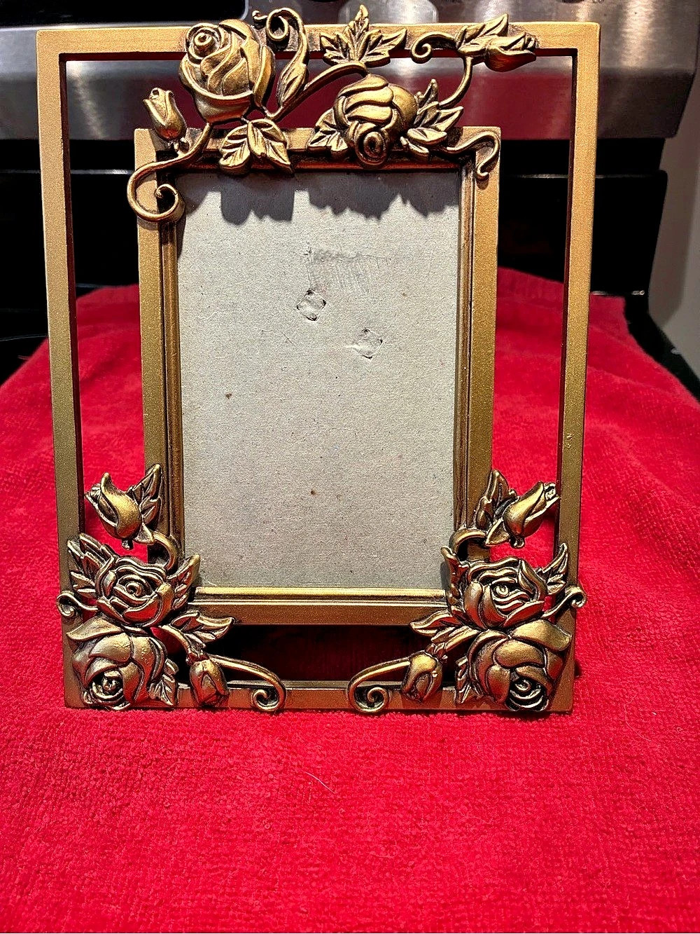 Vintage gold-toned metal rose ornate picture frame